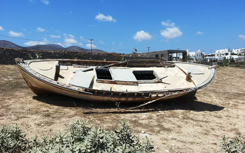 Traditional boat on the shore in Paros