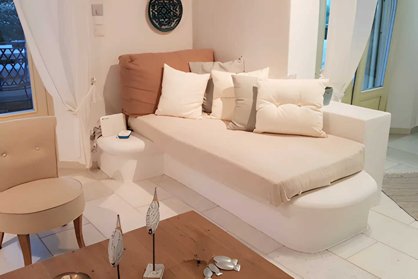 Soft, restful interior at Villa Nausithoe