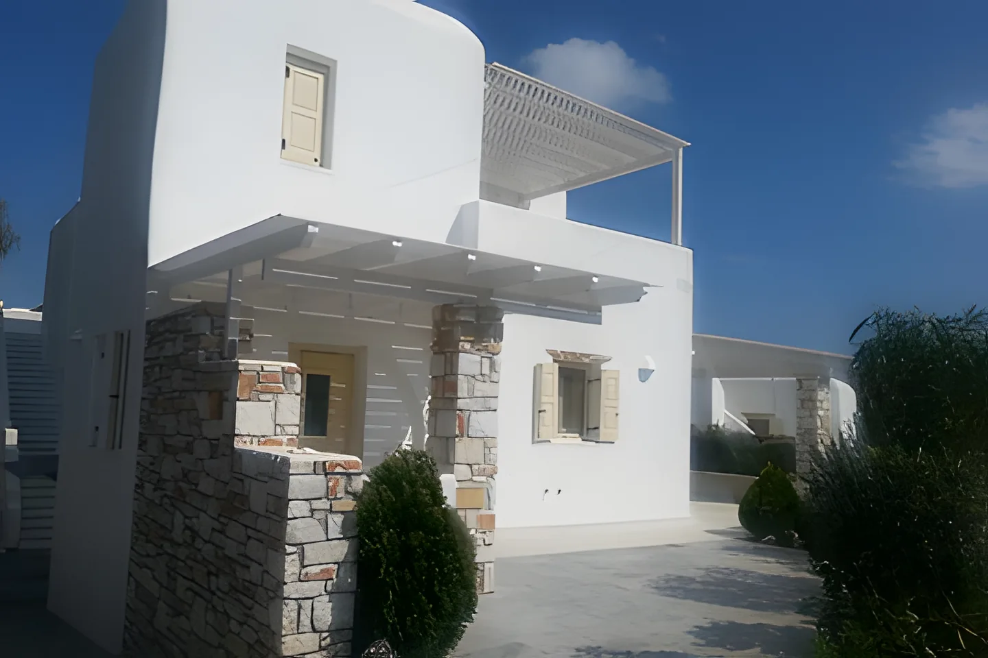 Villa Nausithoe exterior and shaded outdoor areas